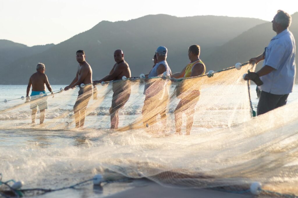 Men Holding A Fishing Net